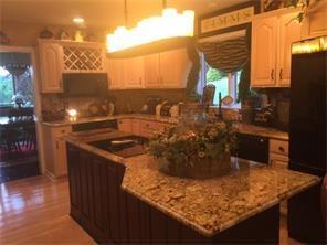 512 Central School Road Grindstone, PA 15442 - Photo 9 of 24 New granite countertops and large kitchen island make cooking a breeze!