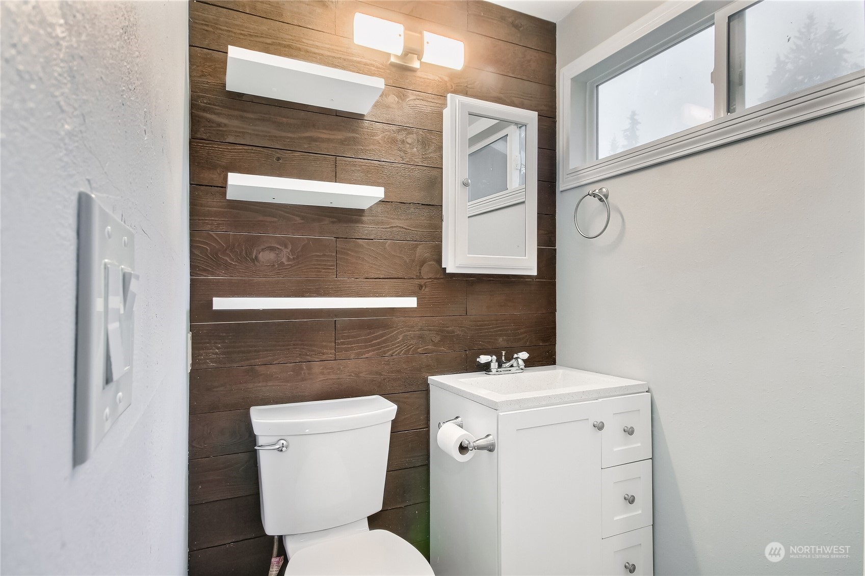 632 217th Street Southwest Bothell, WA 98021 - Photo 14 of 23 a bathroom with a toilet sink and mirror