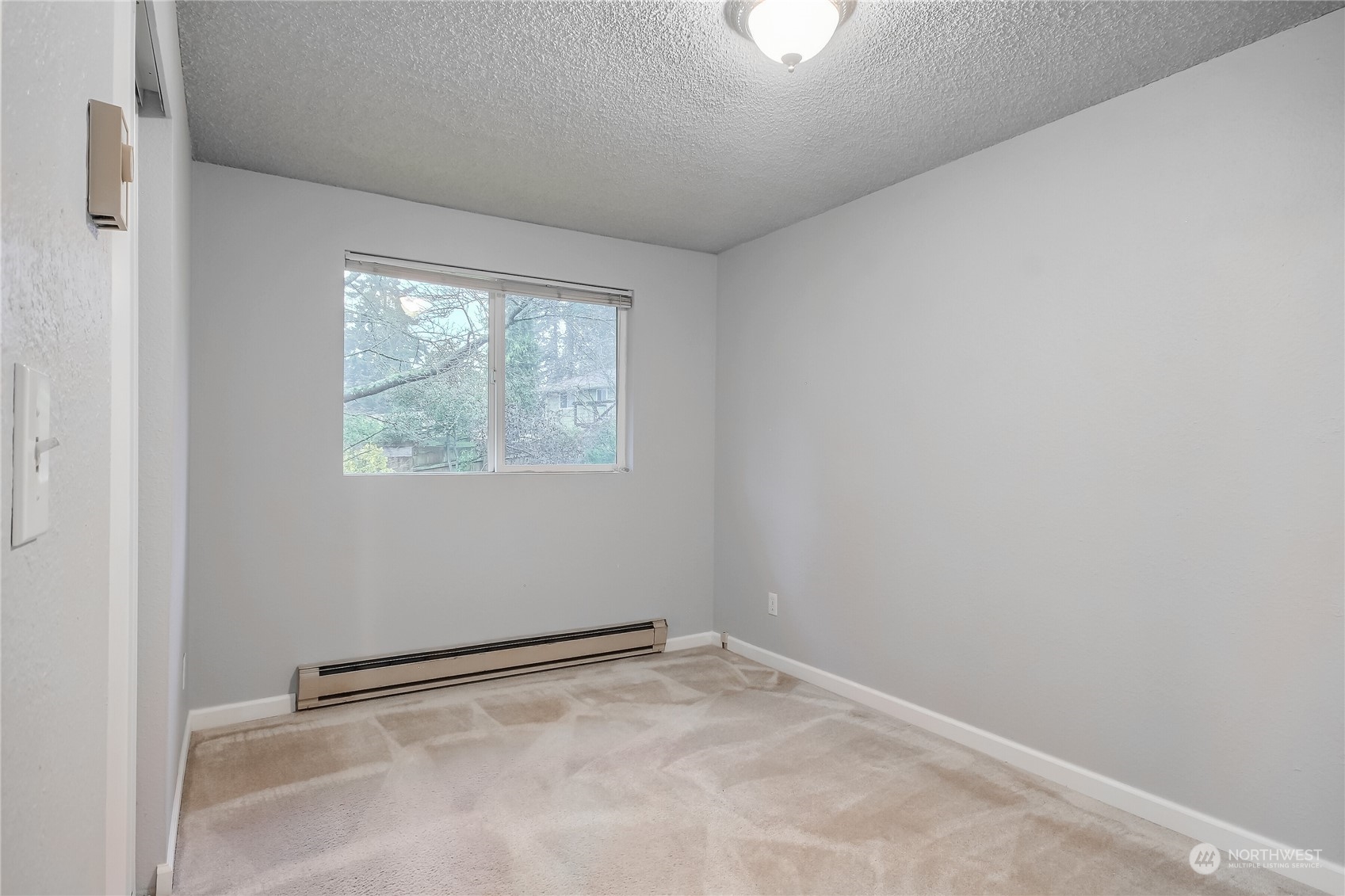 632 217th Street Southwest Bothell, WA 98021 - Photo 17 of 23 an empty room with a window