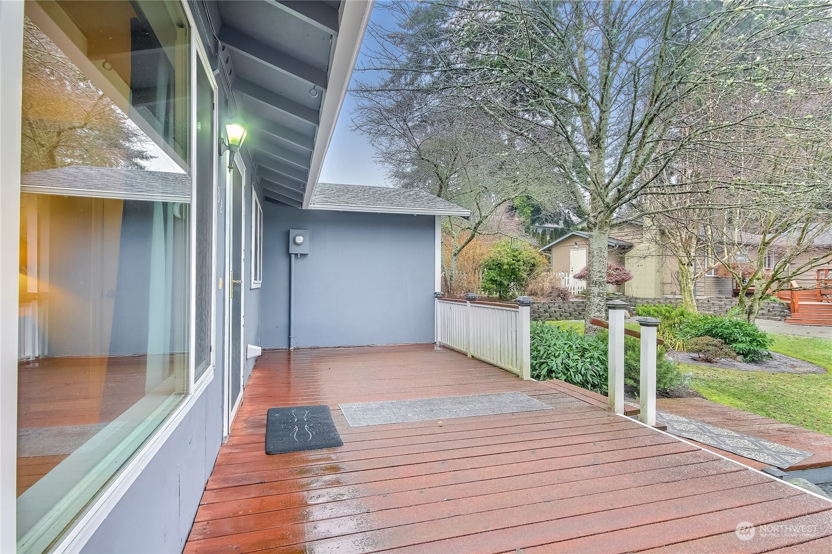 632 217th Street Southwest Bothell, WA 98021 - Photo 3 of 23 a view of a wooden deck besides a house
