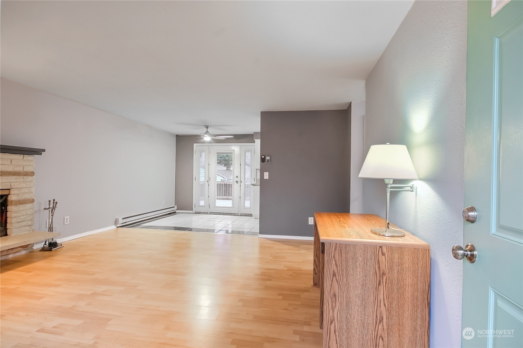 632 217th Street Southwest Bothell, WA 98021 - Photo 5 of 23 a view of a bedroom with wooden floor and chair
