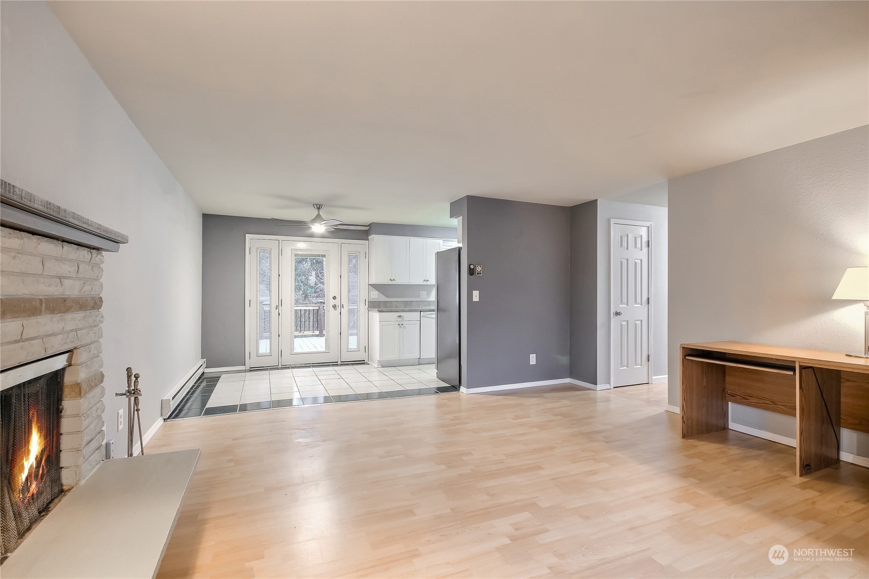 632 217th Street Southwest Bothell, WA 98021 - Photo 7 of 23 a view of an empty room with a fireplace and a window