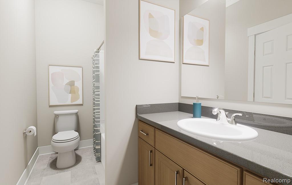 61659 Empire Road South Lyon, MI 48178 - Photo 3 of 21 Full bath featuring vanity, light tile patterned flooring, and shower / bath combination with curtain