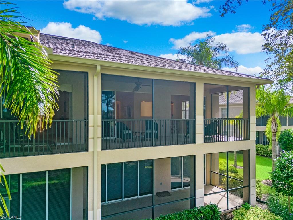 758 Regency Reserve Circle, Unit 2103 Naples, FL 34119 - Photo 37 of 41 a view of a building with a large window