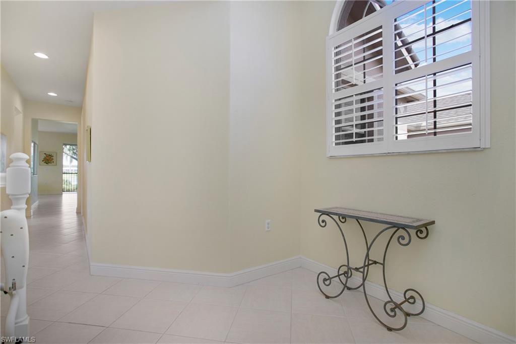 758 Regency Reserve Circle, Unit 2103 Naples, FL 34119 - Photo 7 of 41 a view of entryway with wooden floor