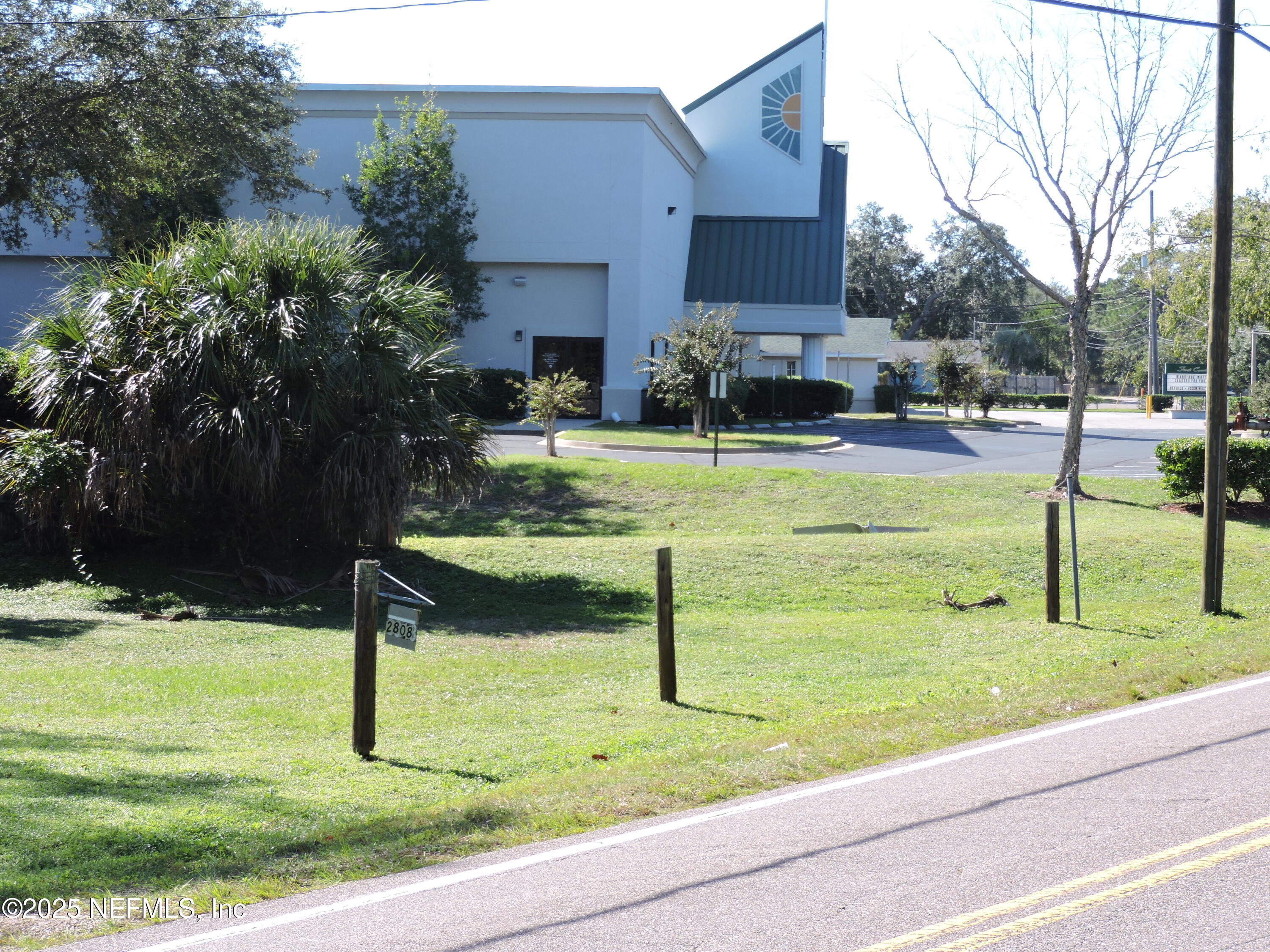 2935 New Berlin Road Jacksonville, FL 32226 - Photo 22 of 45 a view of swimming pool with lawn chairs and plants