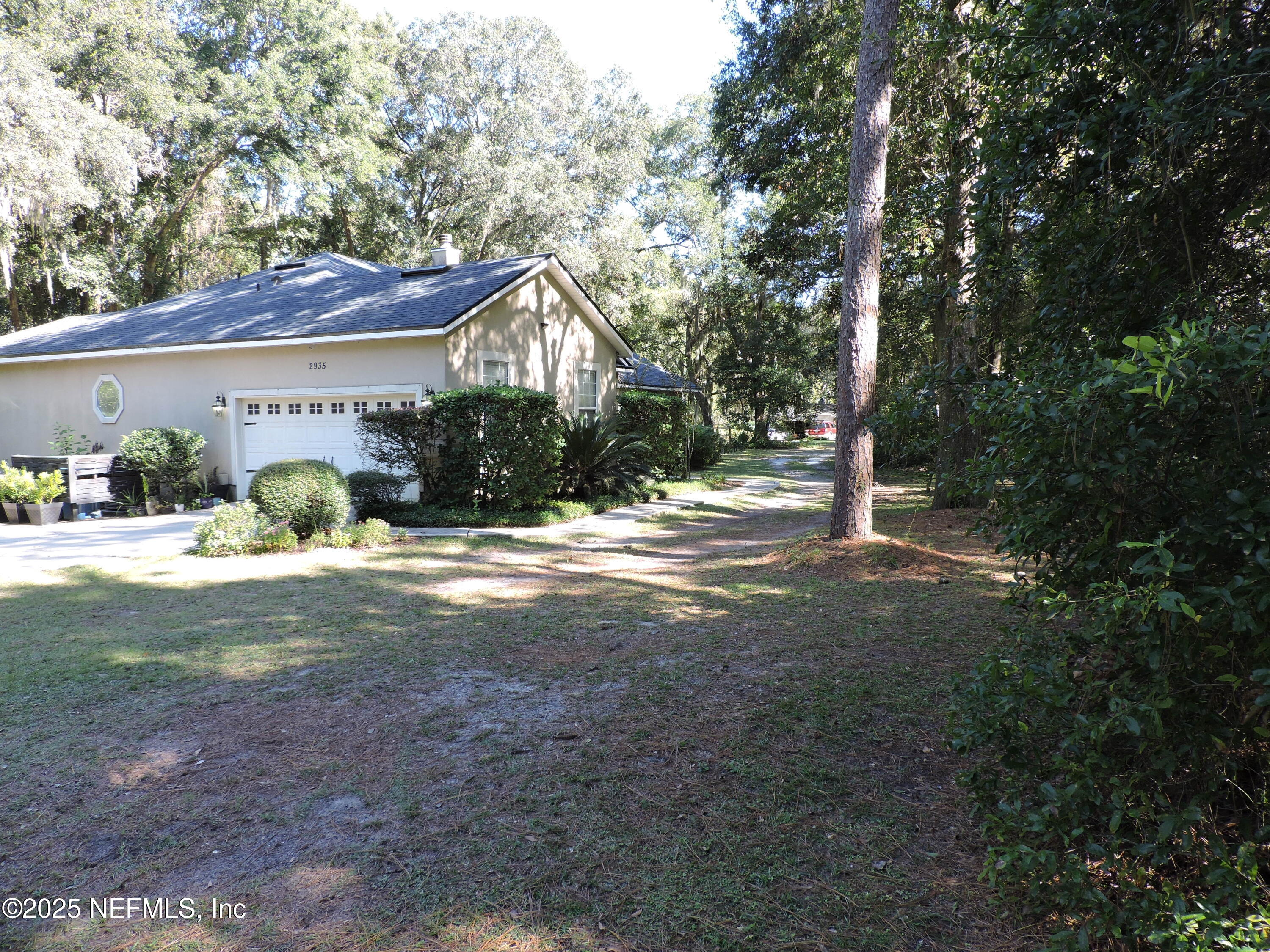 2935 New Berlin Road Jacksonville, FL 32226 - Photo 10 of 45 a view of a house with a yard