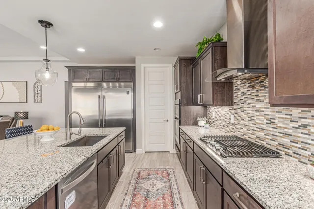 a bedroom with a bed wooden floor and window