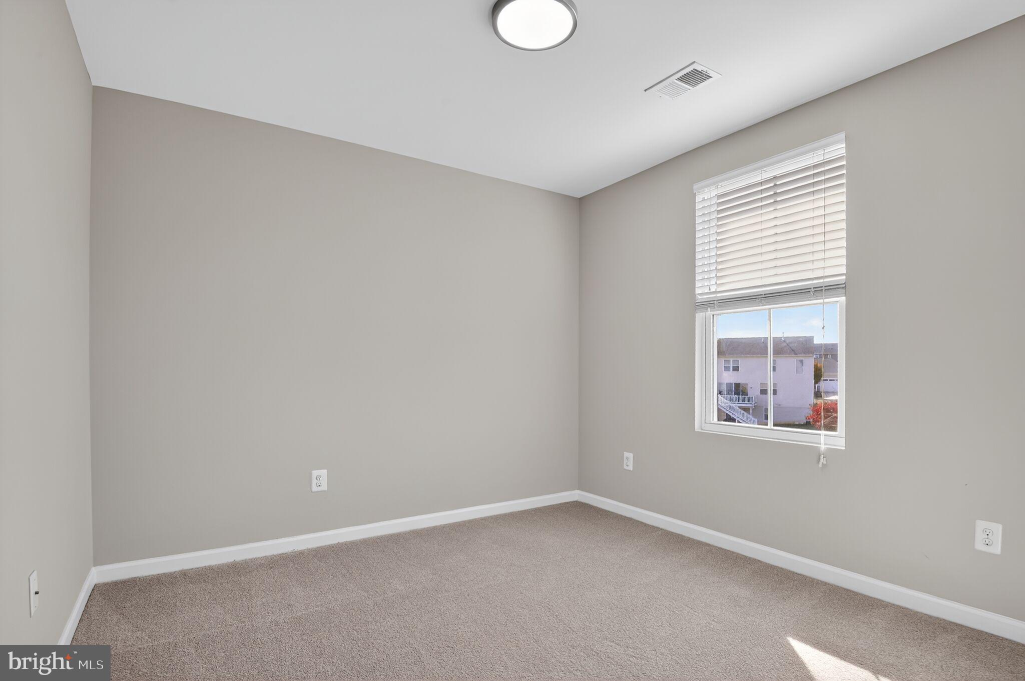 2012 Crepe Myrtle Lane Culpeper, VA 22701 - Photo 19 of 30 an empty room with windows