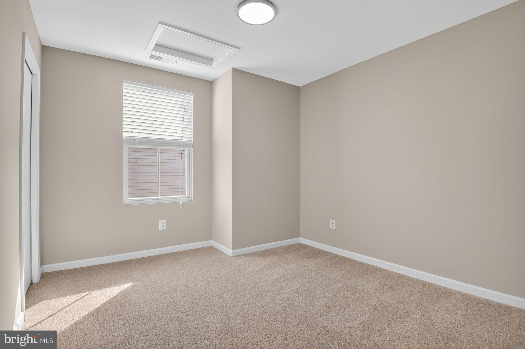 2012 Crepe Myrtle Lane Culpeper, VA 22701 - Photo 22 of 30 an empty room with windows and closet