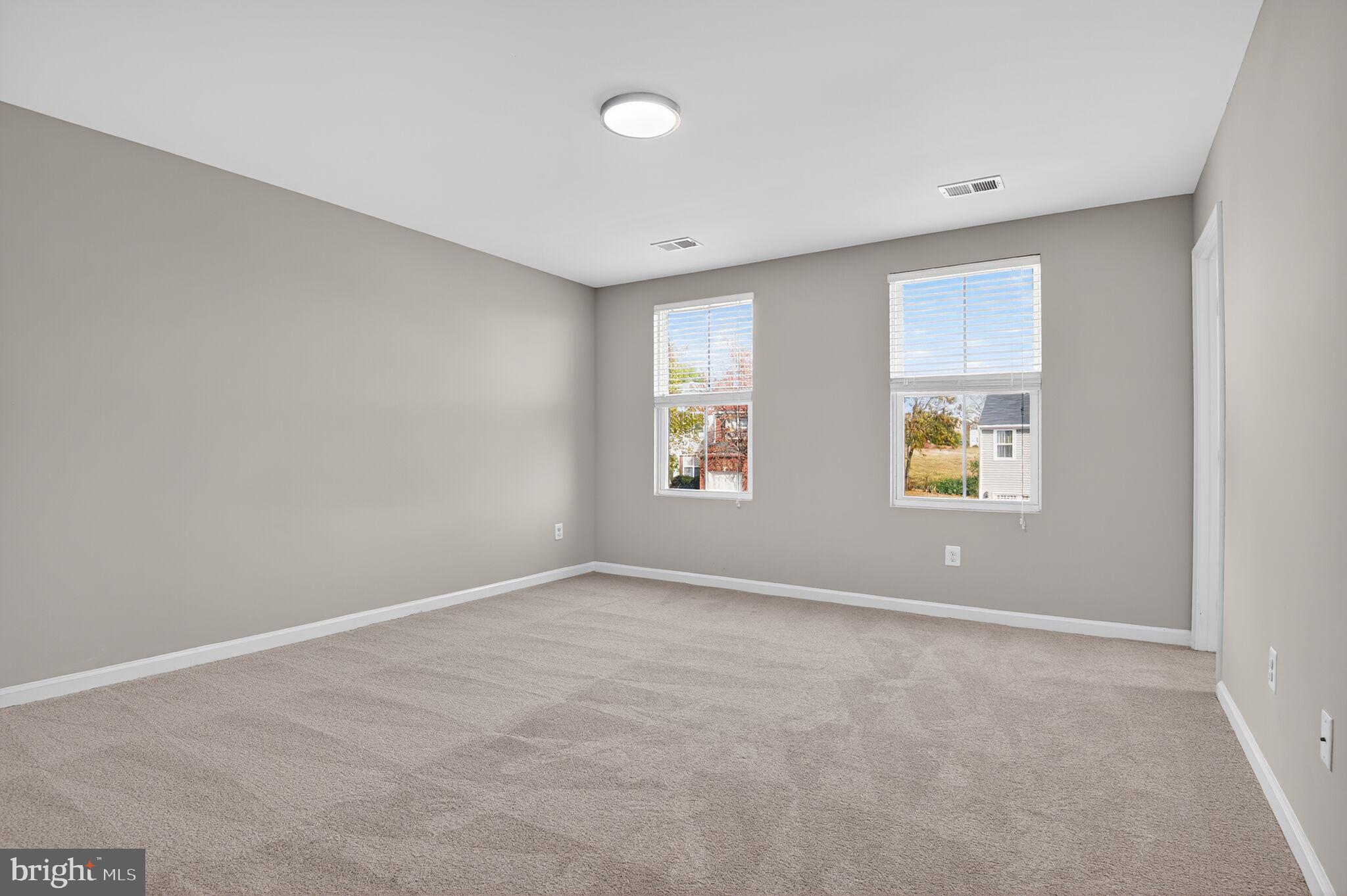 2012 Crepe Myrtle Lane Culpeper, VA 22701 - Photo 26 of 30 an empty room with windows