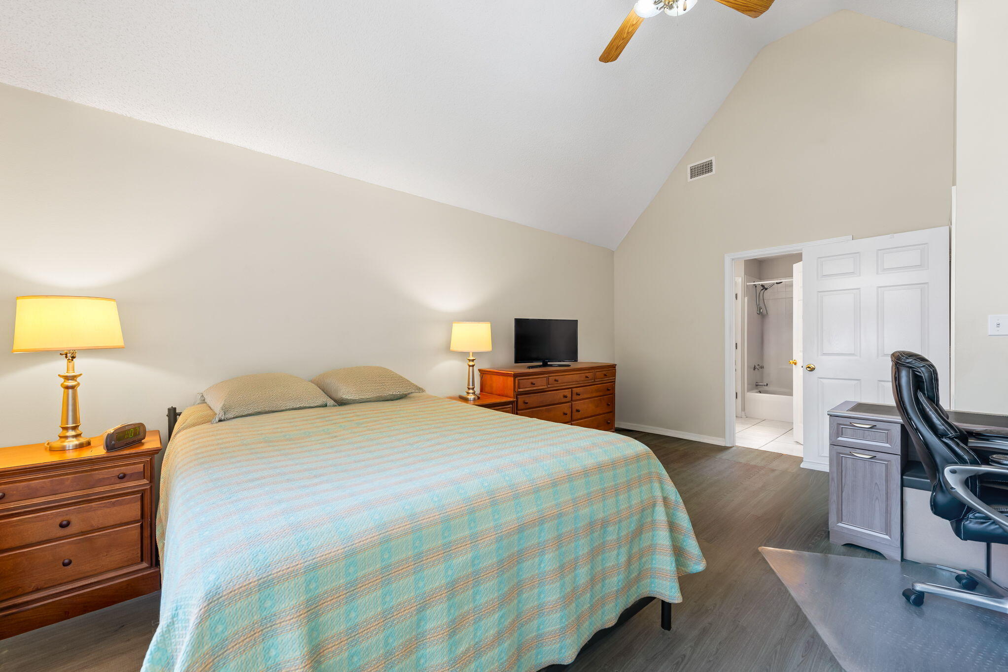 1931 Commodore Drive Navarre, FL 32566 - Photo 23 of 65 primary bedroom with en suite