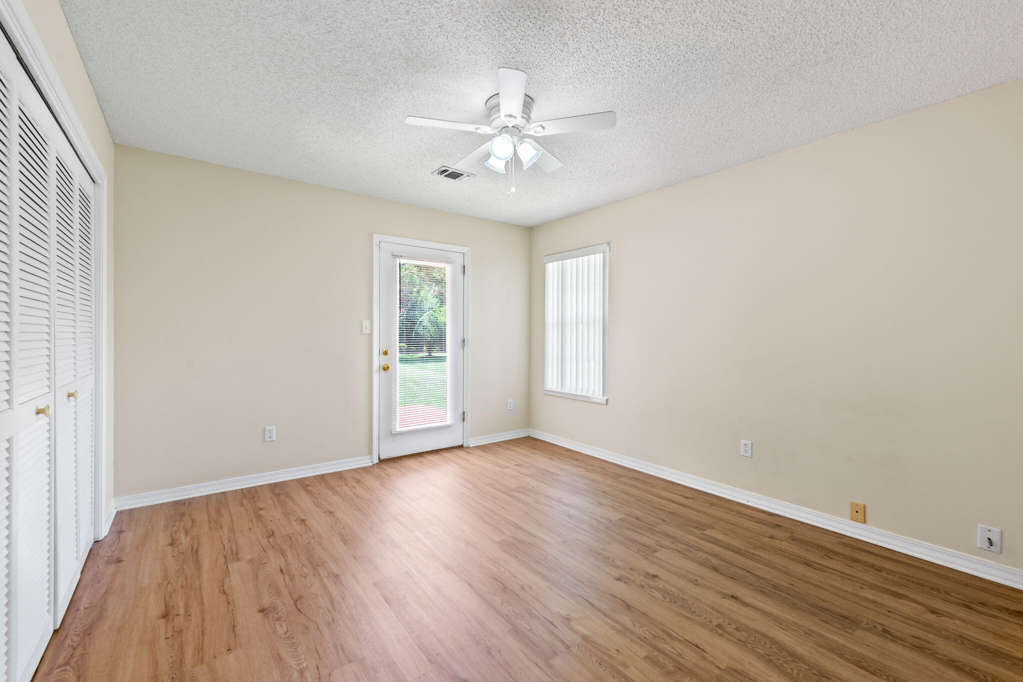 1931 Commodore Drive Navarre, FL 32566 - Photo 29 of 65 bedroom with deck access
