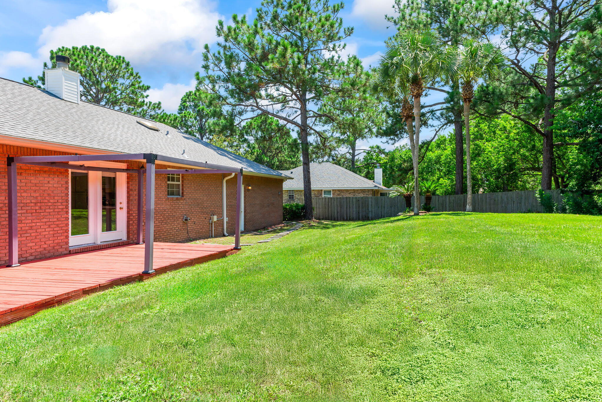 1931 Commodore Drive Navarre, FL 32566 - Photo 3 of 65 spacious back yard