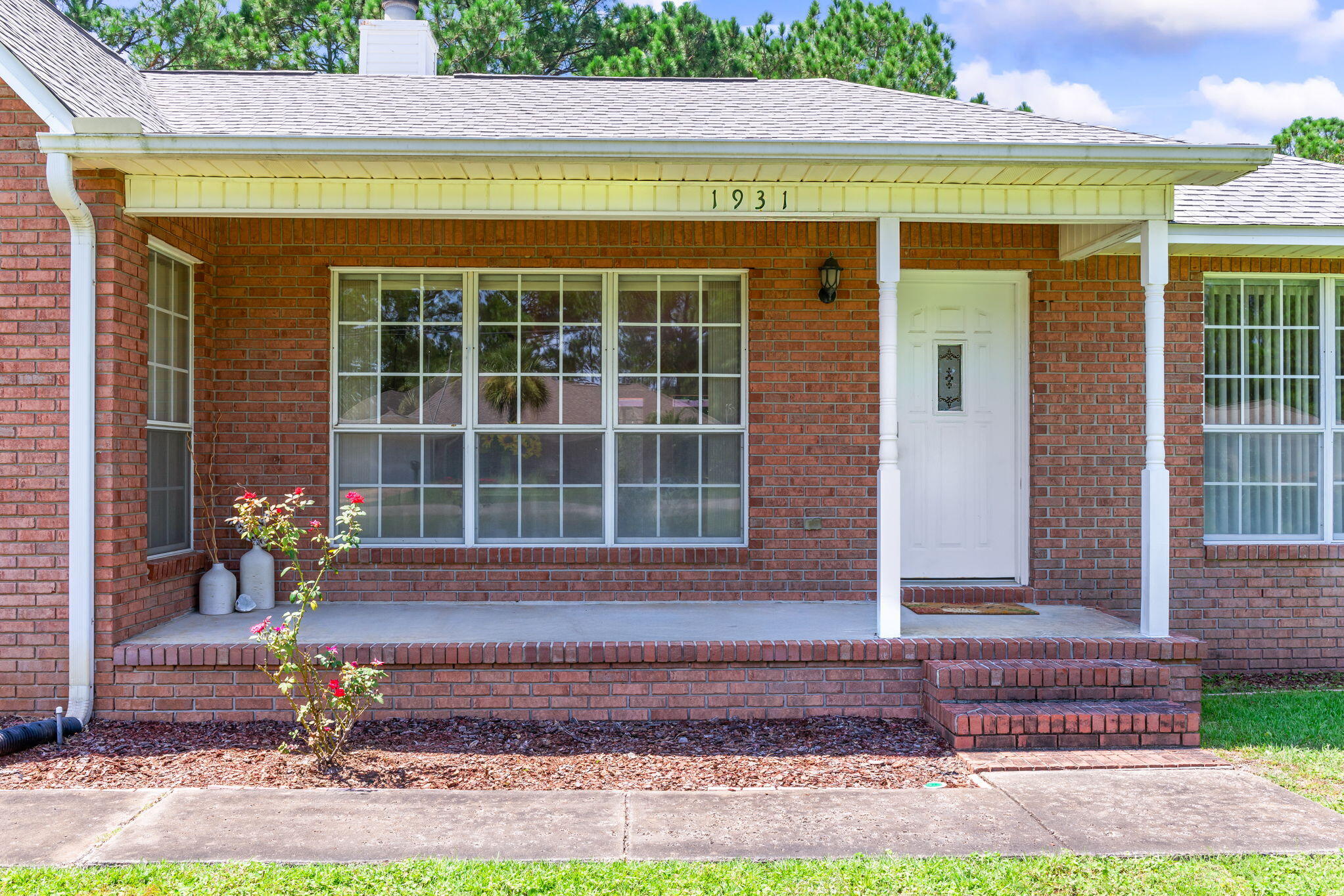 1931 Commodore Drive Navarre, FL 32566 - Photo 35 of 65 front entry detail porch