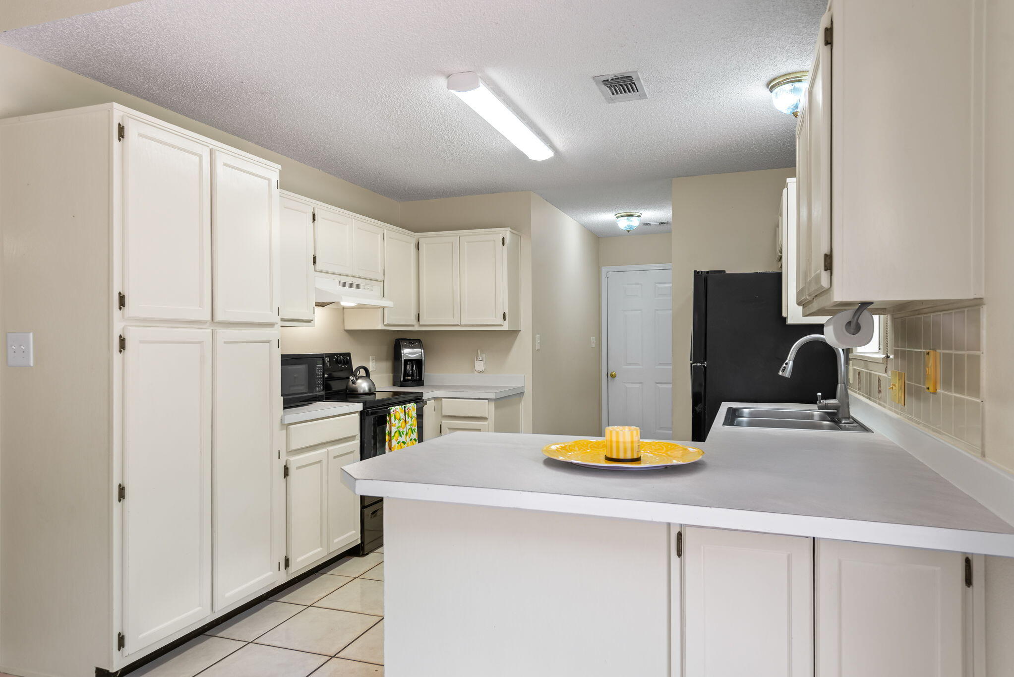 1931 Commodore Drive Navarre, FL 32566 - Photo 8 of 65 kitchen cabinetry
