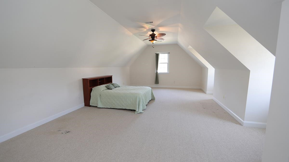 263 Waterville Street Raleigh, NC 27603 - Photo 15 of 23 Great Natural Light Upstairs in this Multi Purpose Room. Offers Large Closet and Access to Floored 200+ Square Feet of Walk In Attic. Bonus - Flex Room