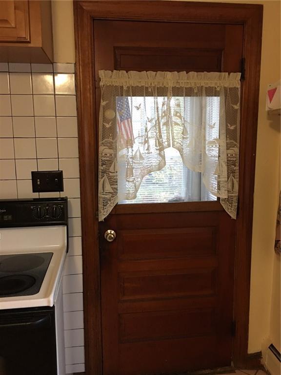 6 Fobes Street Portland, ME 04103 - Photo 8 of 26 Side entry with mudroom and steps to...