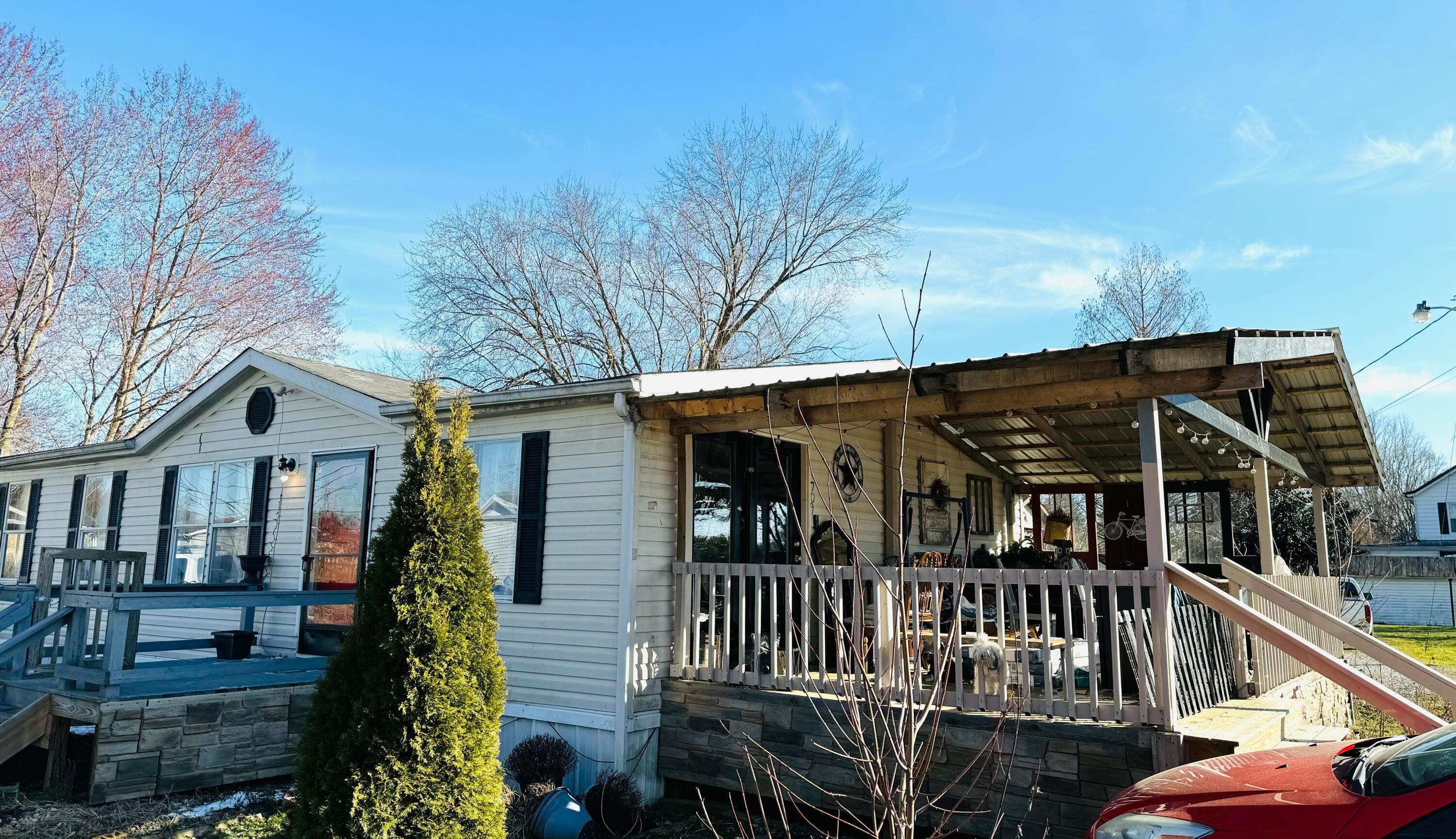 709 South Broadway Street Racine, OH 45771 - Photo 23 of 27 Side view of home