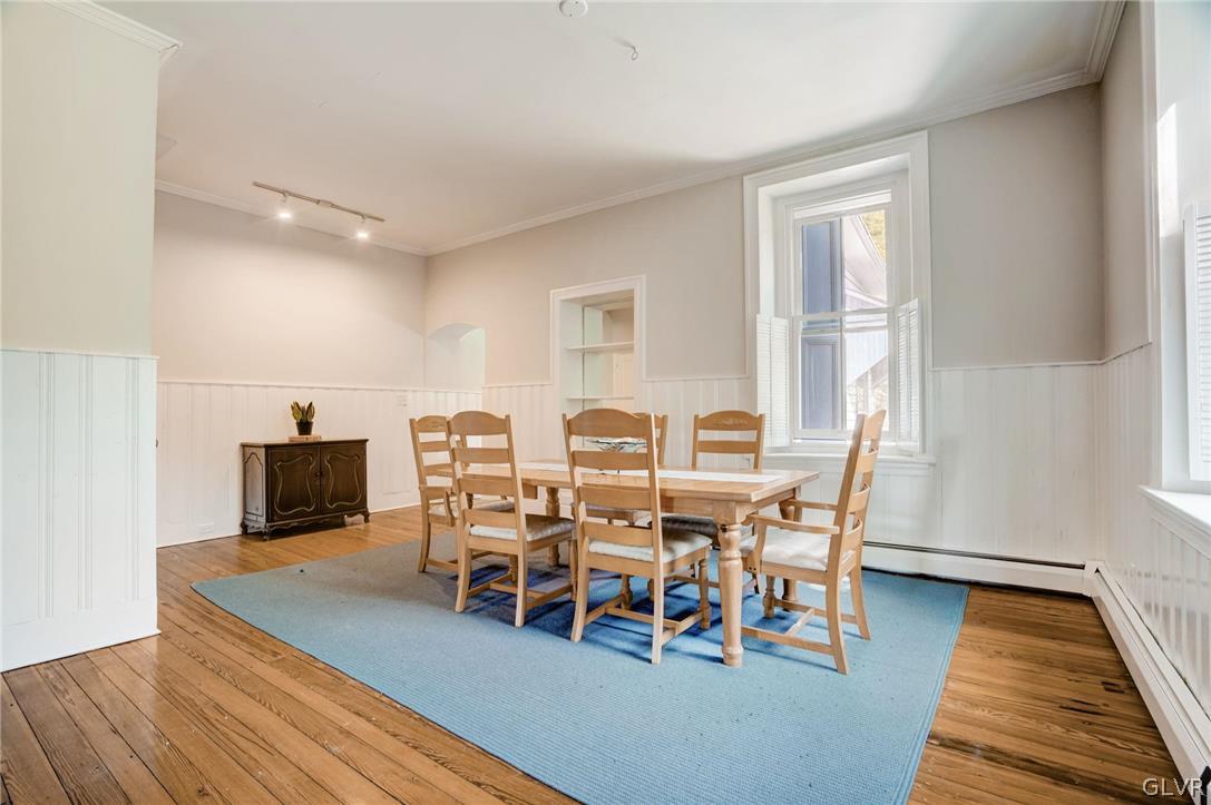 135 Delaware Road Riegelsville, PA 18077 - Photo 12 of 33 a view of a dining room with furniture window and wooden floor