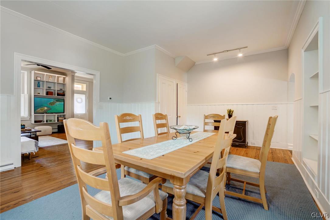 135 Delaware Road Riegelsville, PA 18077 - Photo 13 of 33 a view of a dining room with furniture and wooden floor