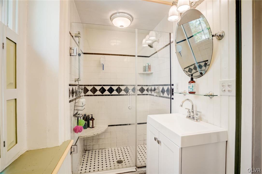 135 Delaware Road Riegelsville, PA 18077 - Photo 20 of 33 a bathroom with a sink and a mirror