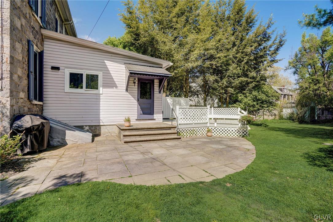 135 Delaware Road Riegelsville, PA 18077 - Photo 29 of 33 a view of a house with a yard and sitting area