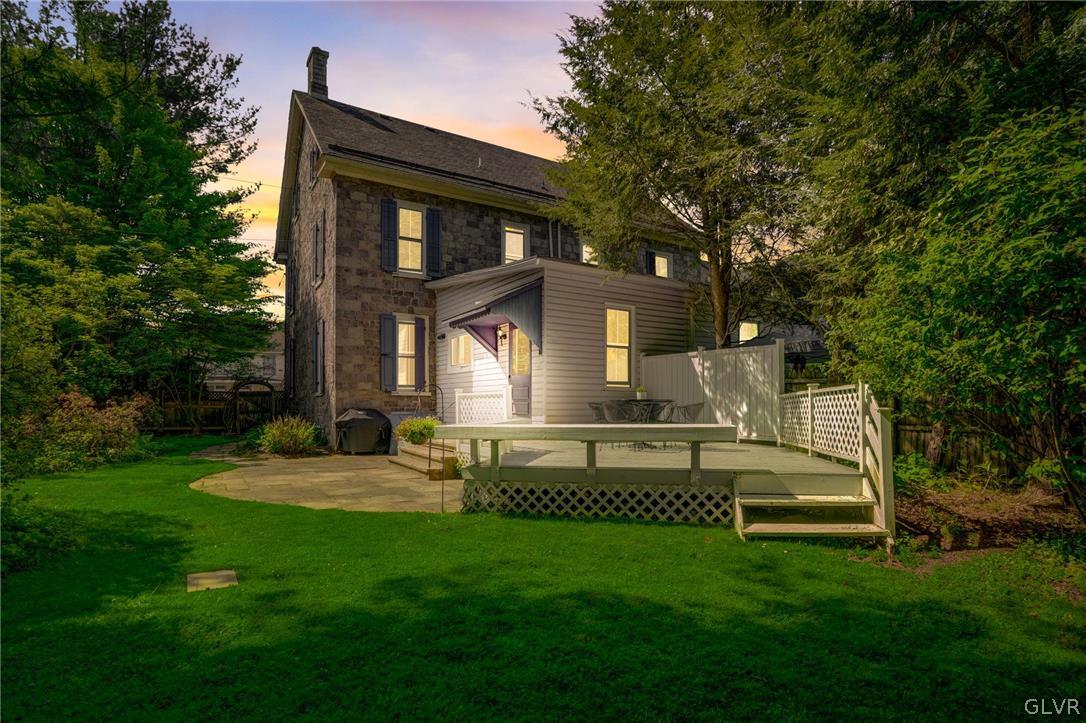 135 Delaware Road Riegelsville, PA 18077 - Photo 32 of 33 a front view of a house with a yard