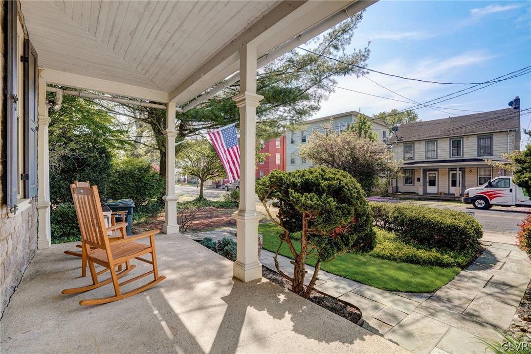 135 Delaware Road Riegelsville, PA 18077 - Photo 5 of 33 a view of a two chairs in the patio in front of a house