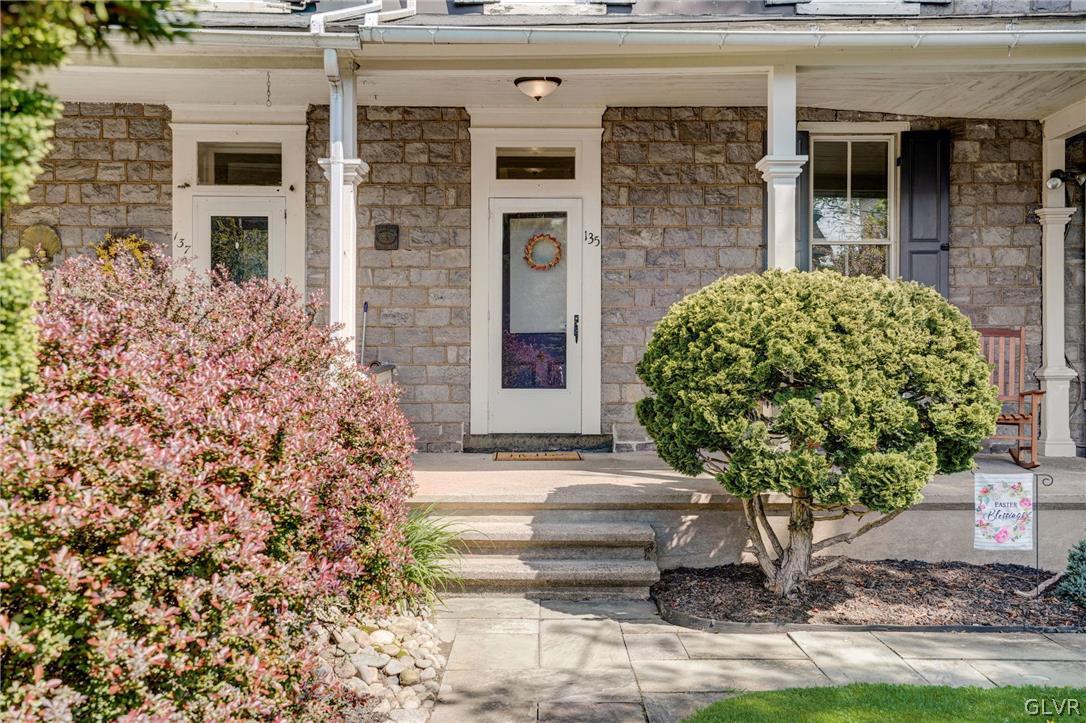 135 Delaware Road Riegelsville, PA 18077 - Photo 7 of 33 a front view of a house with garden