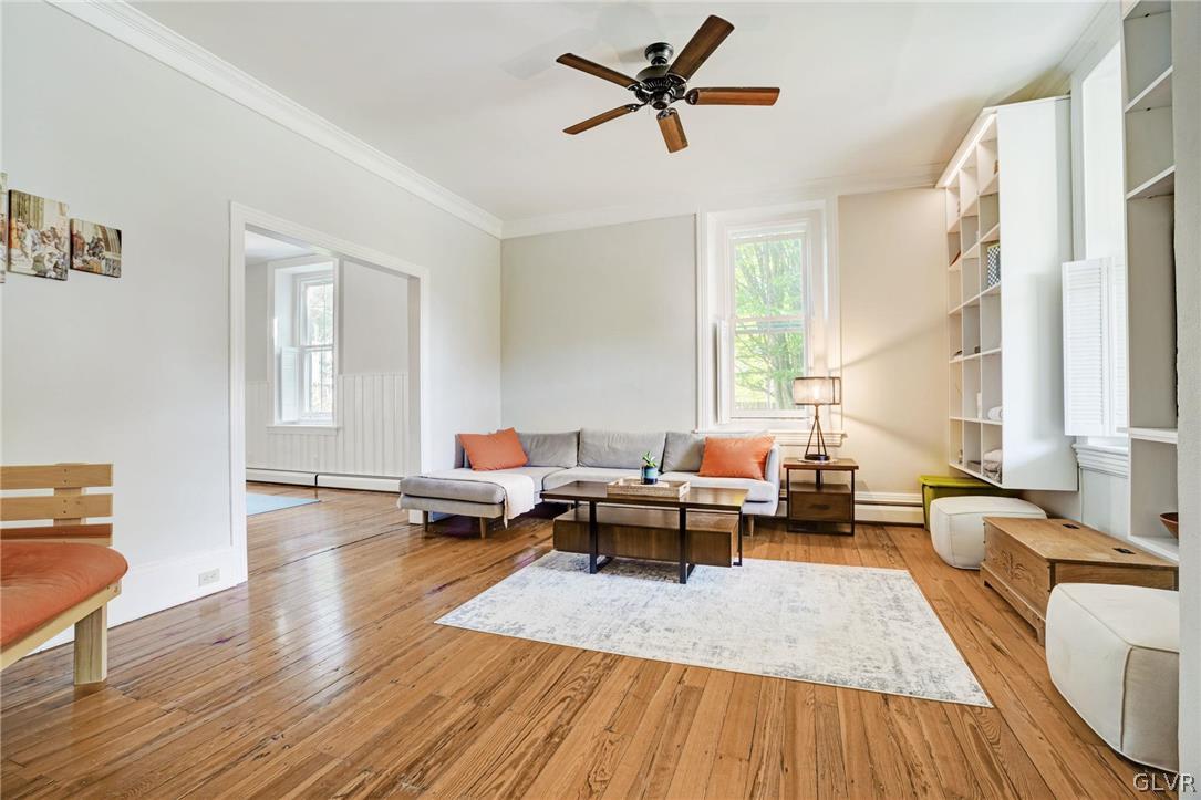 135 Delaware Road Riegelsville, PA 18077 - Photo 9 of 33 a living room with furniture wooden floor and a window