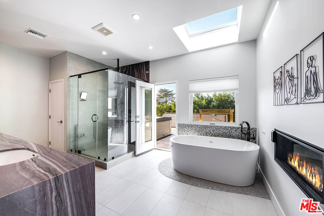 523 East Fairmount Road Burbank, CA 91501 - Photo 21 of 30 a spacious bathroom with a tub and shower