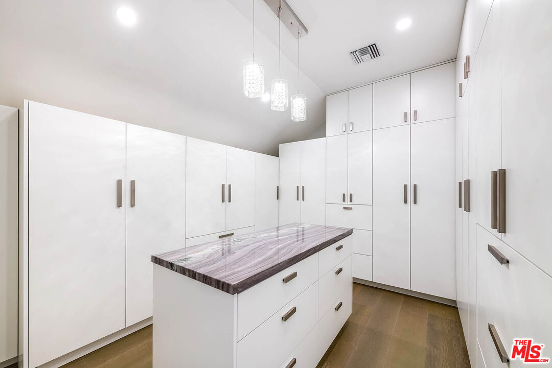 523 East Fairmount Road Burbank, CA 91501 - Photo 24 of 30 a bathroom with a granite countertop sink a toilet and a shower