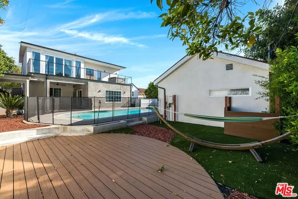 a house view with a garden space