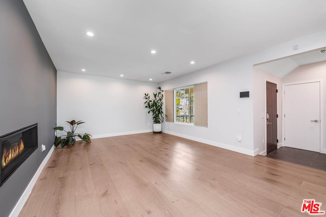 523 East Fairmount Road Burbank, CA 91501 - Photo 4 of 30 a view of livingroom with furniture window and wooden floor