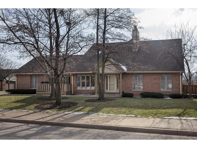 1943 Koehling Road Northbrook, IL 60062 - Photo 2 of 12 front view of a house with a yard