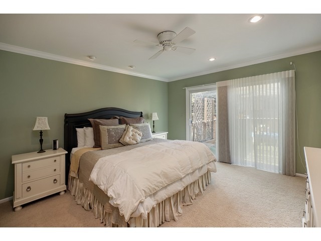 1943 Koehling Road Northbrook, IL 60062 - Photo 7 of 12 a bedroom with a large bed and a large window