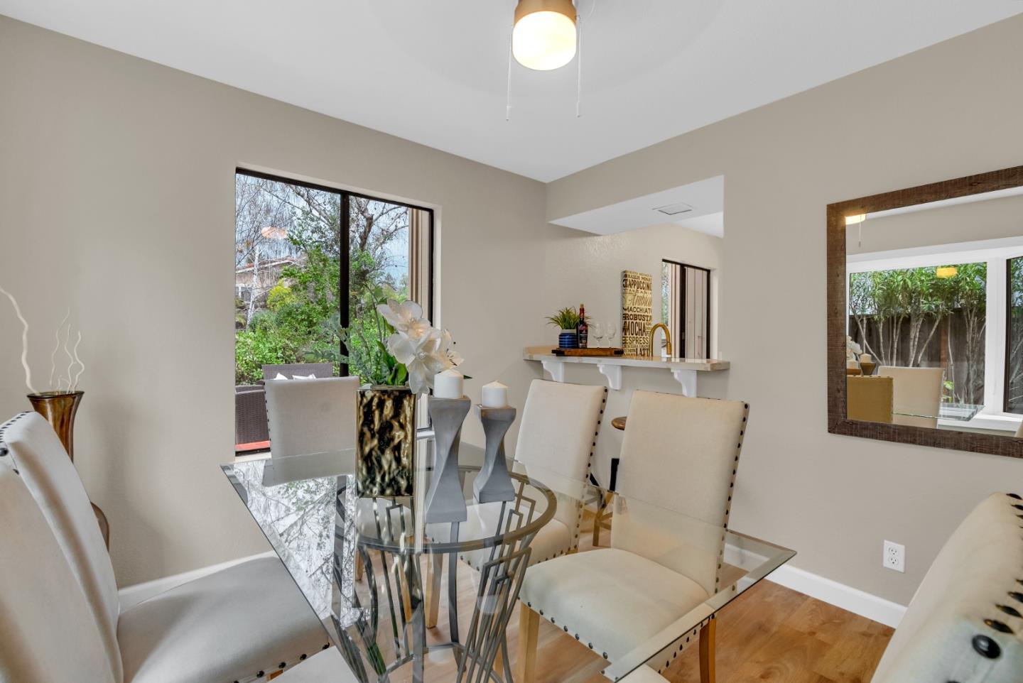 22483 McClellan Road Cupertino, CA 95014 - Photo 30 of 38 a view of a dining room with furniture window and wooden floor