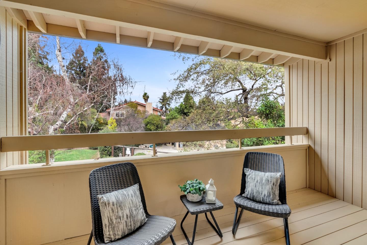 22483 McClellan Road Cupertino, CA 95014 - Photo 4 of 38 a outdoor sitting area with furniture and painting on wall