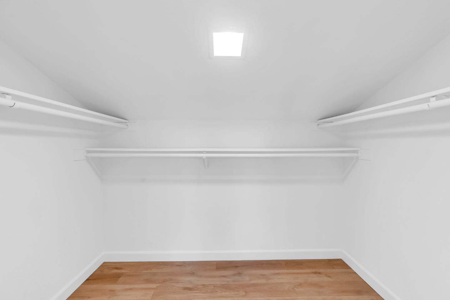22483 McClellan Road Cupertino, CA 95014 - Photo 8 of 38 a view of a room with wooden floor and closet
