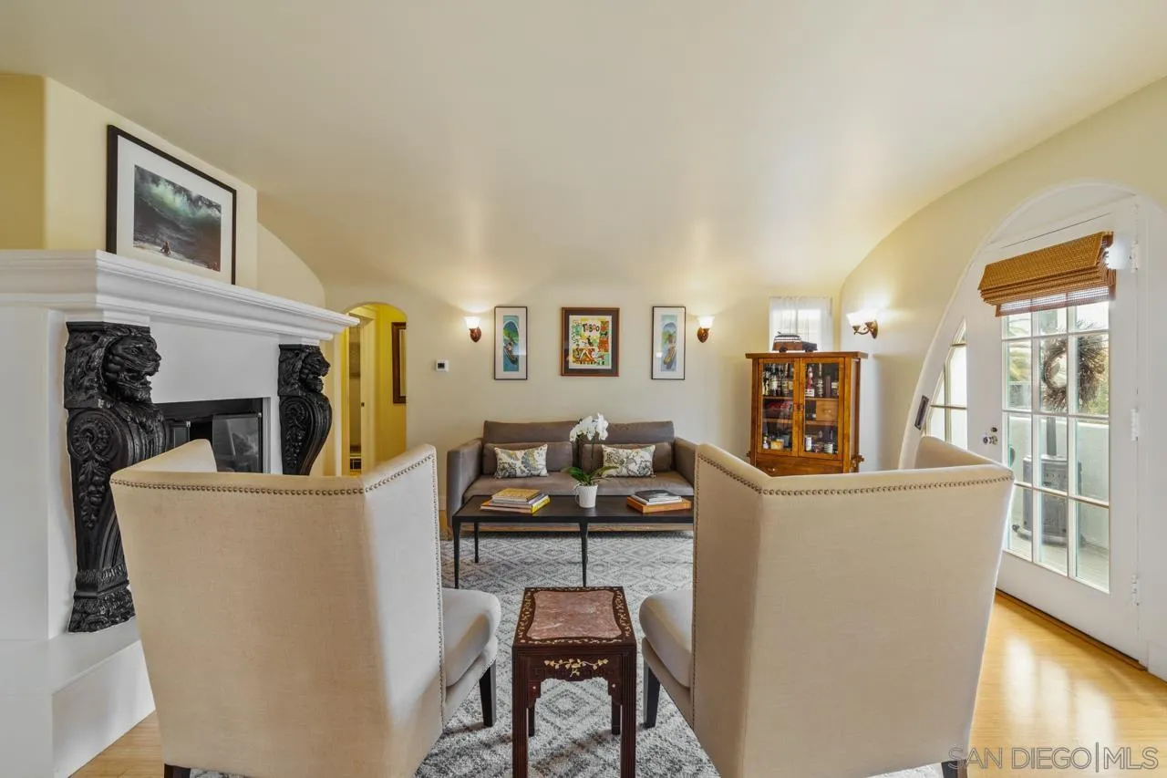 425 Sea Lane La Jolla, CA 92037 - Photo 12 of 41 a living room with furniture and a flat screen tv