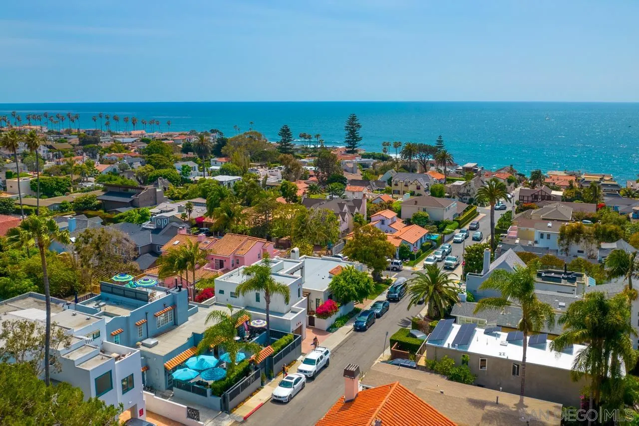 425 Sea Lane La Jolla, CA 92037 - Photo 2 of 41 an aerial view of a city with lots of residential buildings and ocean view