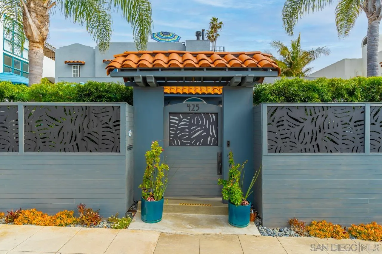 425 Sea Lane La Jolla, CA 92037 - Photo 3 of 41 a front view of a house with a garage