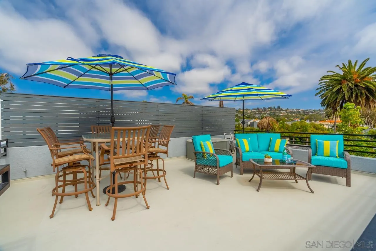 425 Sea Lane La Jolla, CA 92037 - Photo 40 of 41 an outdoor space with furniture and umbrella