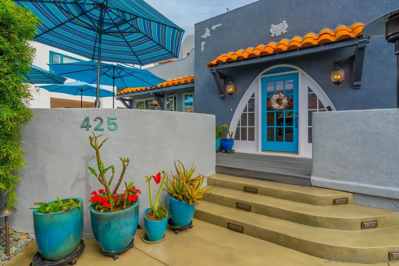 425 Sea Lane La Jolla, CA 92037 - Photo 5 of 41 a front view of a house with a potted plant
