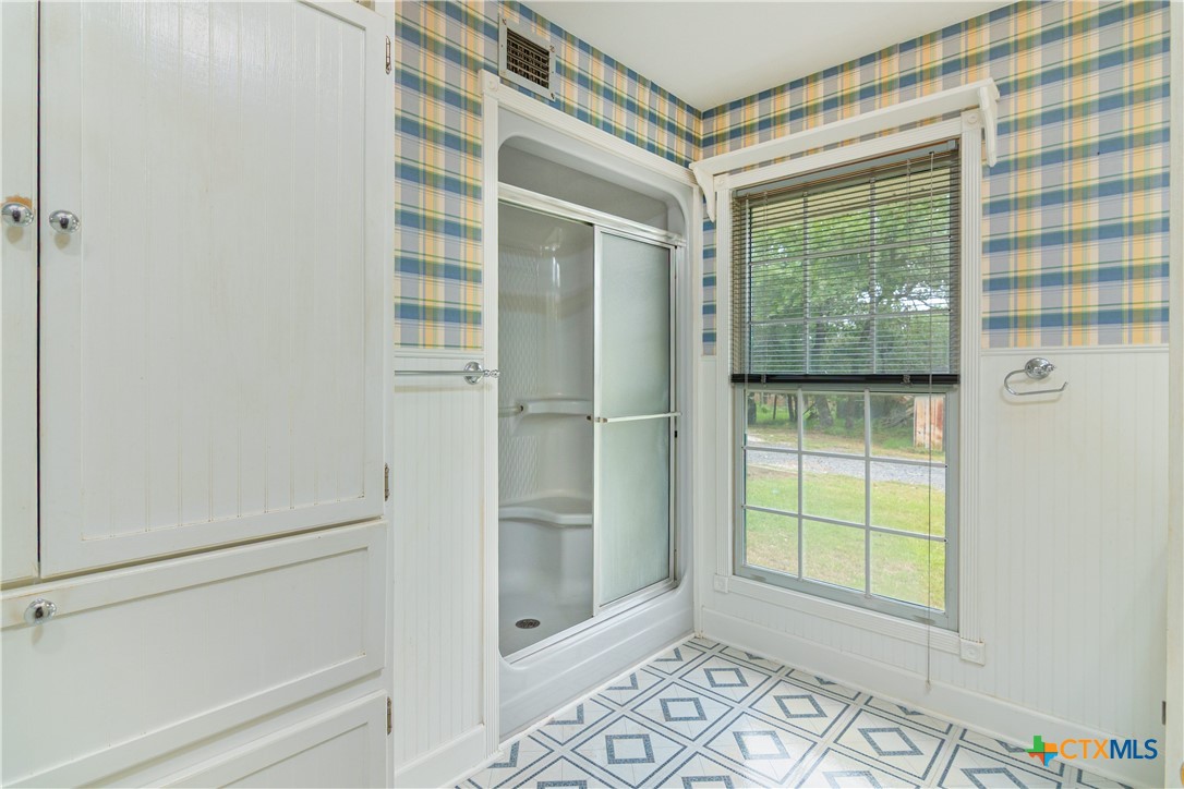 2981 Vivroux Ranch Road Seguin, TX 78155 - Photo 21 of 43 a bathroom with a shower