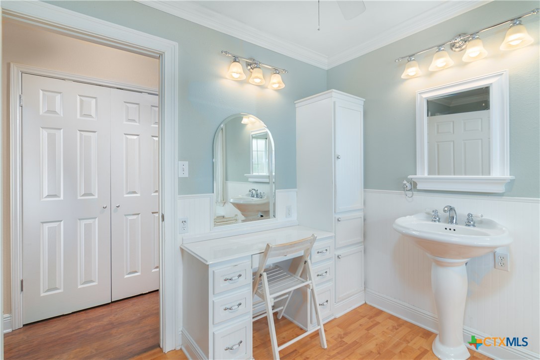 2981 Vivroux Ranch Road Seguin, TX 78155 - Photo 23 of 43 a spacious bathroom with a double vanity sink mirror and