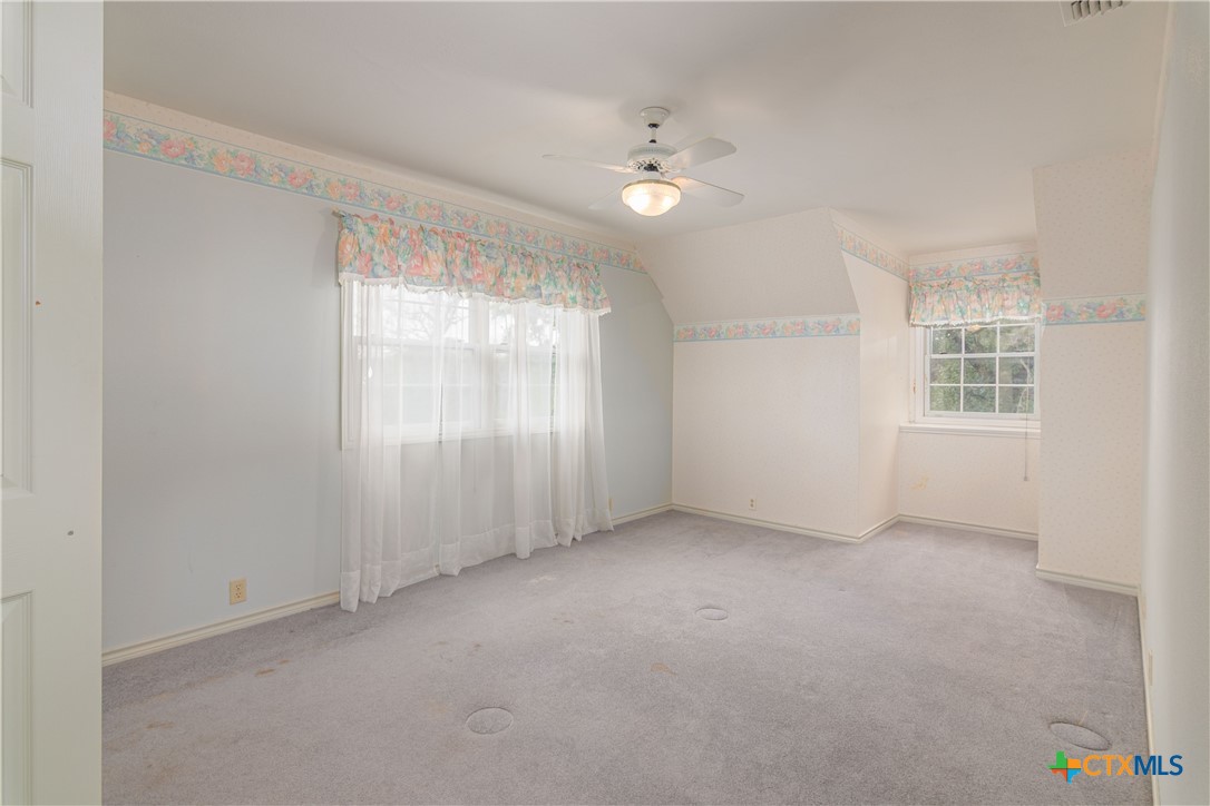 2981 Vivroux Ranch Road Seguin, TX 78155 - Photo 27 of 43 a view of an empty room with a window
