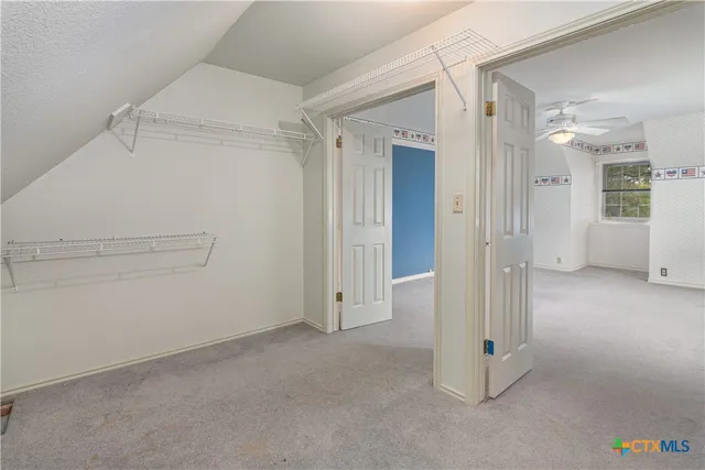 a aerial view of a house with swimming pool and big yard