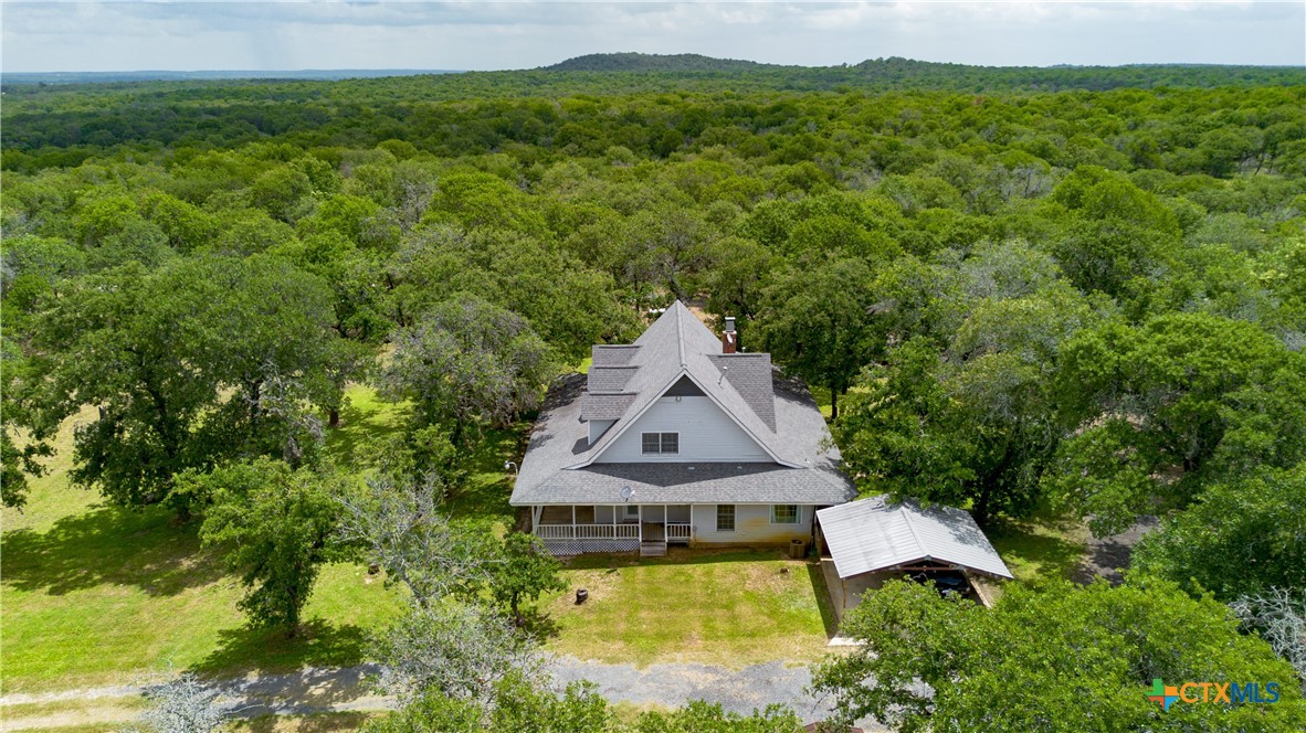2981 Vivroux Ranch Road Seguin, TX 78155 - Photo 37 of 43 a aerial view of a house with swimming pool and big yard